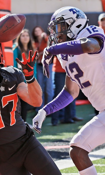 Hubbard's 223 yards, 2 TDs lead Oklahoma St past TCU 34-27